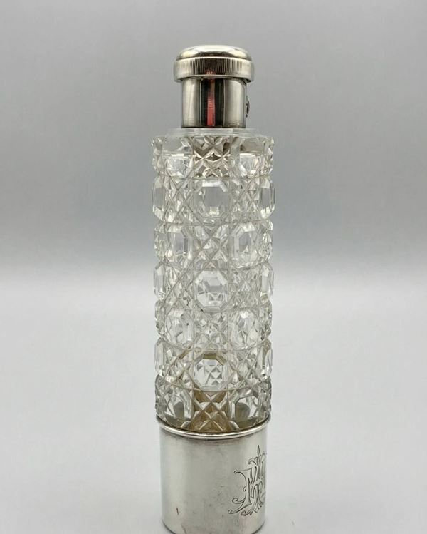 Crystal and silver perfume bottle