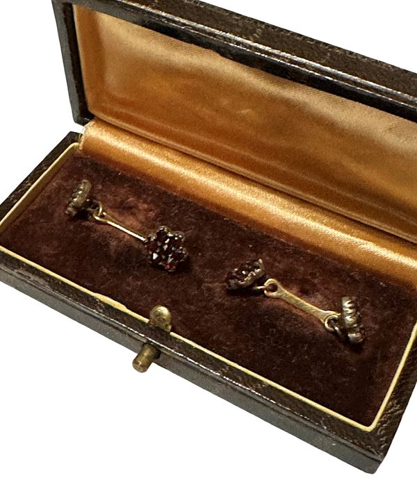 Pair of cufflinks in silver and yellow gold