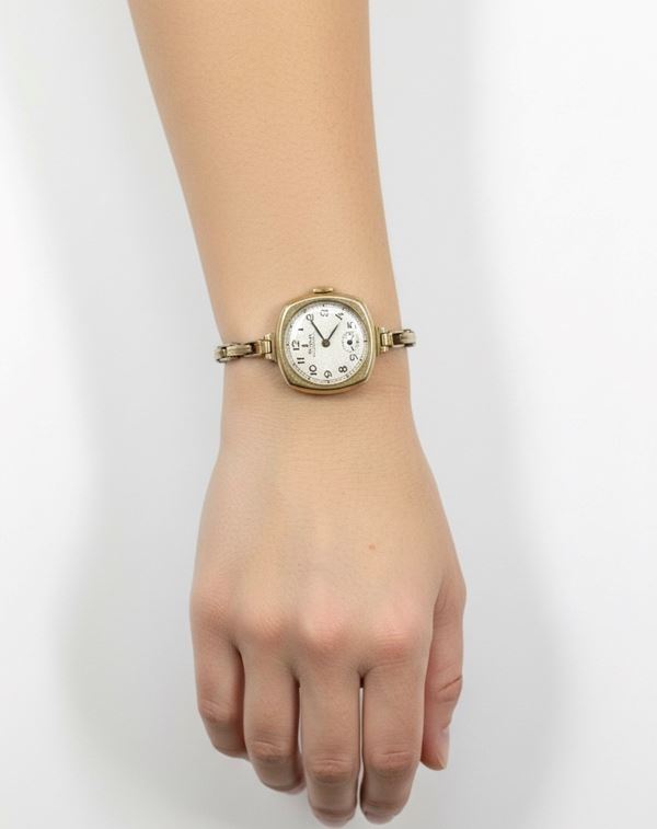 A Lady’s 14kt Yellow Gold Rolex