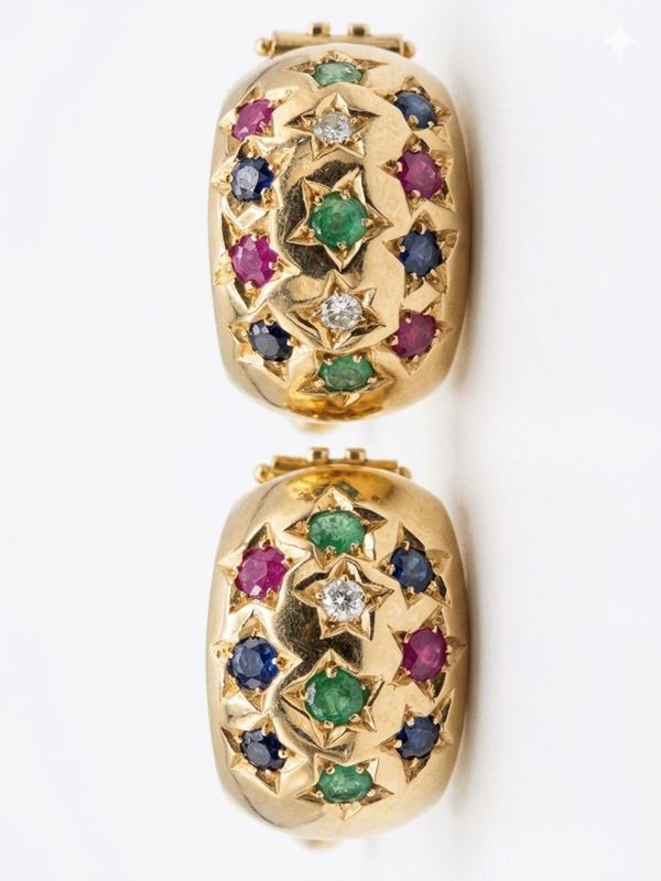 GOLD AND RUBY, EMERALD EARRING CIRCA 1980